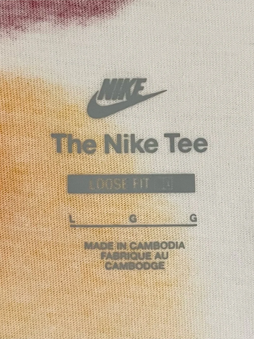 Nike Cropped Chest Graphic Tie-Dye Tee. White with Red/Blue/Yellow Spots. Sz L